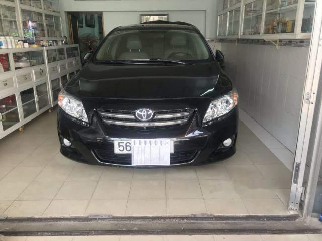 Toyota Corolla altis 2010 - Cần bán lại xe Toyota Corolla altis sản xuất năm 2010, màu đen