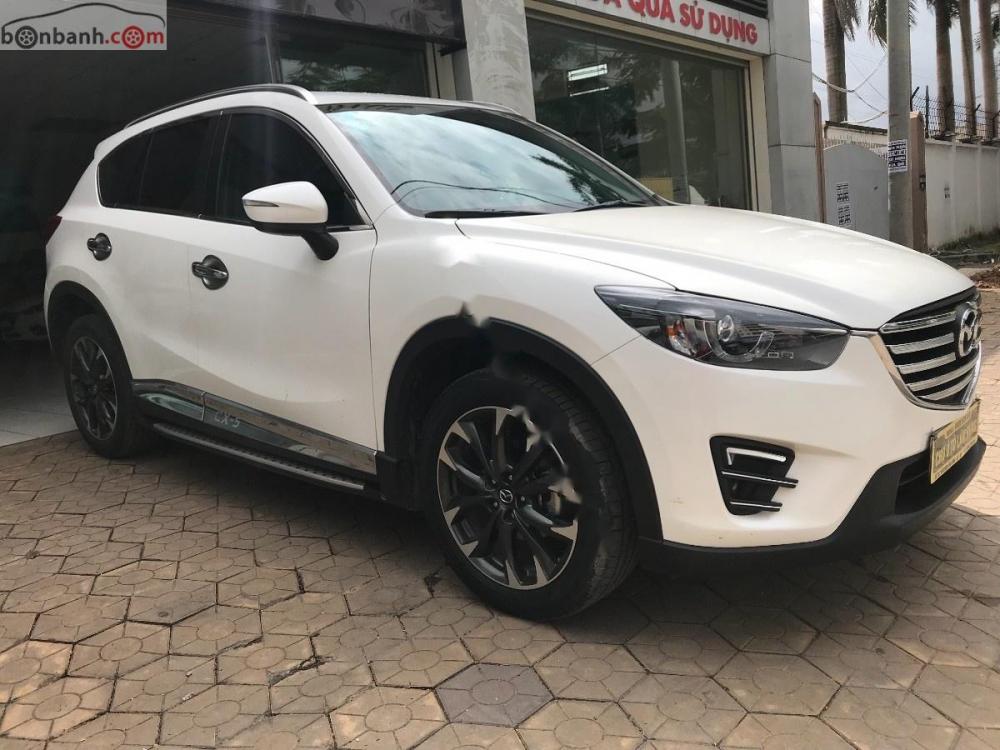 Mazda CX 5 2.0 AT 2016 - Cần bán gấp Mazda CX 5 2.0 AT 2016, màu trắng chính chủ, giá tốt