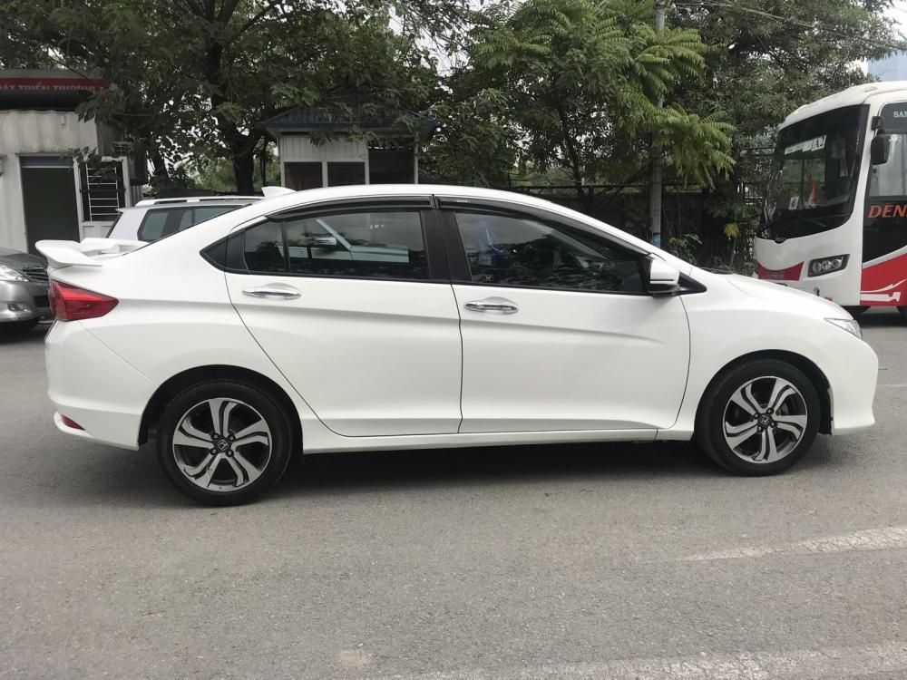 Honda City 1.5 2015 - Cần bán lại xe Honda City sản xuất 2015 màu trắng, 495 triệu