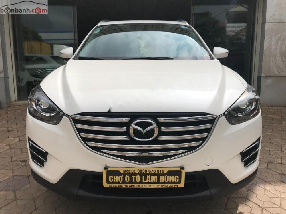 Mazda CX 5 2.0 AT 2016 - Cần bán gấp Mazda CX 5 2.0 AT 2016, màu trắng chính chủ, giá tốt