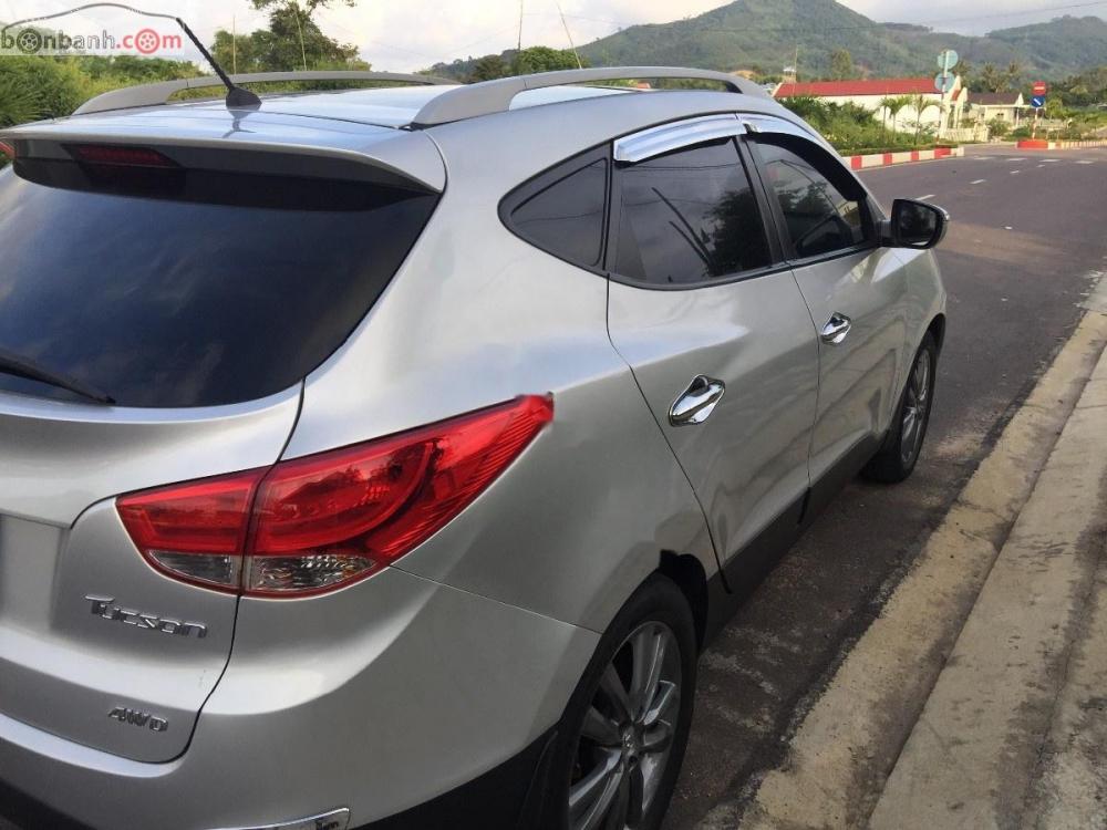 Hyundai Tucson 2.0 AT 4WD 2011 - Bán Hyundai Tucson 2.0 AT 4WD đời 2011, màu bạc, nhập khẩu, số tự động