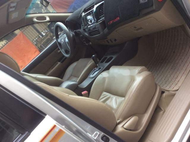 Toyota Fortuner AT 2014 - Xe Toyota Fortuner AT năm 2014, màu bạc số tự động, giá chỉ 770 triệu
