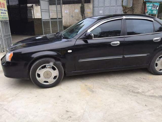 Daewoo Magnus 2004 - Bán xe Daewoo Magnus 2004, màu đen, giá 110tr