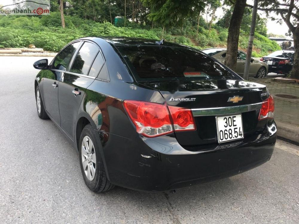 Chevrolet Cruze LS 1.6 MT 2010 - Bán Chevrolet Cruze LS 1.6 MT sản xuất 2010, màu đen chính chủ, giá tốt