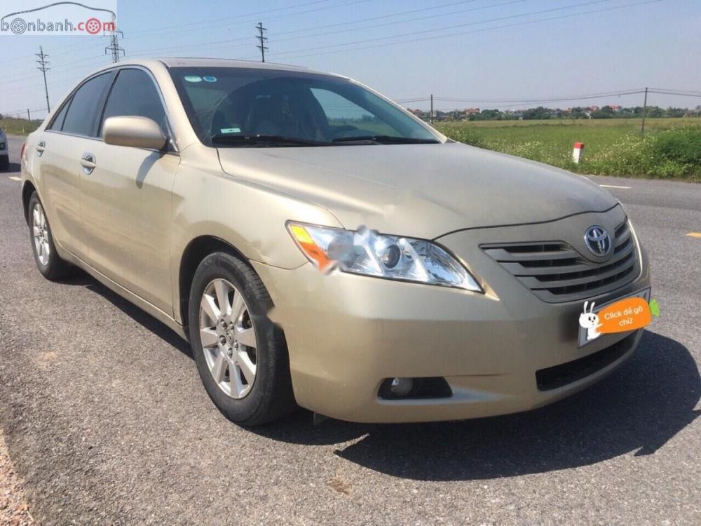 Toyota Camry 2.4 2007 - Bán Toyota Camry 2.4 sản xuất 2007, màu vàng, nhập khẩu nguyên chiếc chính chủ 