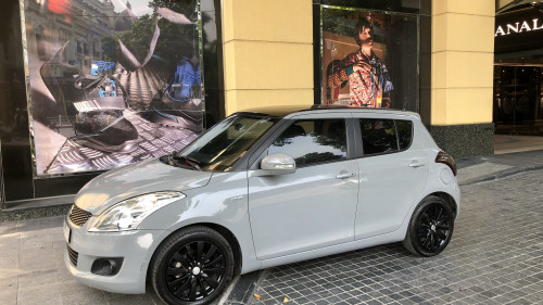 Suzuki Swift  1.4 AT  2014 - Bán Suzuki Swift 1.4 AT sản xuất 2014, màu trắng chính chủ