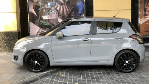 Suzuki Swift  1.4 AT  2014 - Bán Suzuki Swift 1.4 AT sản xuất 2014, màu trắng chính chủ