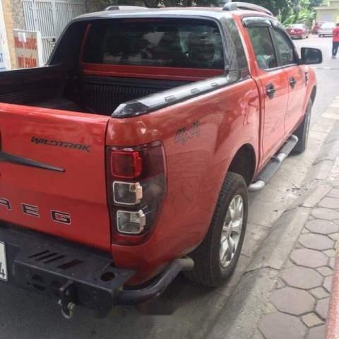 Ford Ranger Wildtrak 3.2L  AT 4X4 2014 - Bán Ford Ranger Wildtrak 3.2L  AT 4X4 sản xuất năm 2014, màu đỏ, xe nhập chính chủ