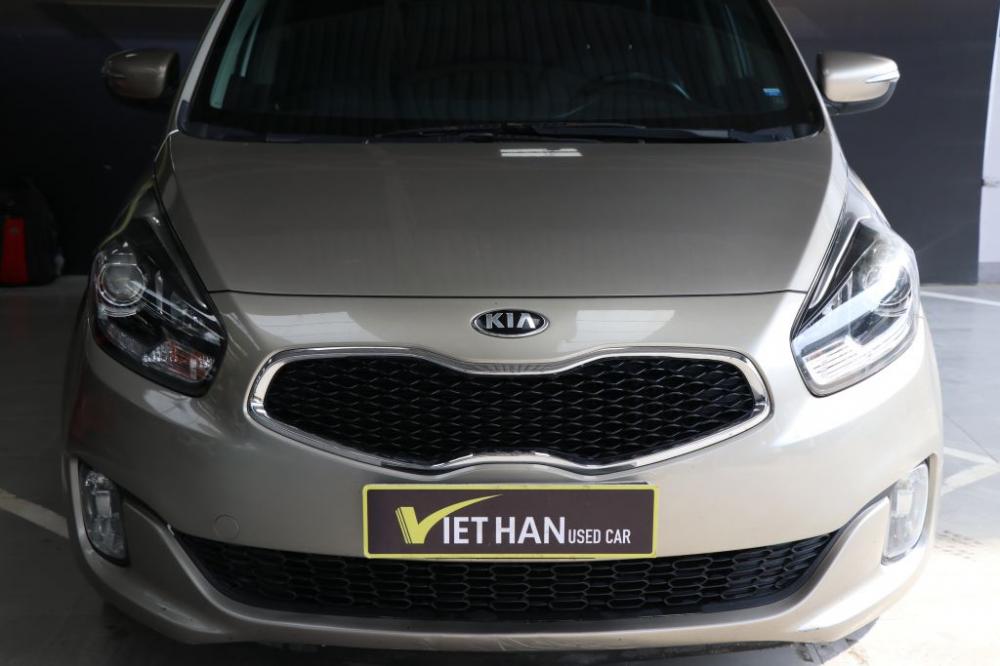 Kia Rondo 1.7MT 2015 - Bán xe Kia Rondo 1.7MT 2015, màu vàng, giá chỉ 548 triệu