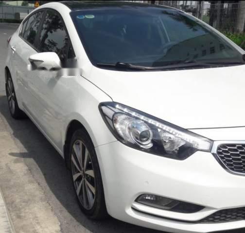 Kia K3  2.0  2015 - Bán Kia K3 2.0 2015, màu trắng, đi đúng 53000 km