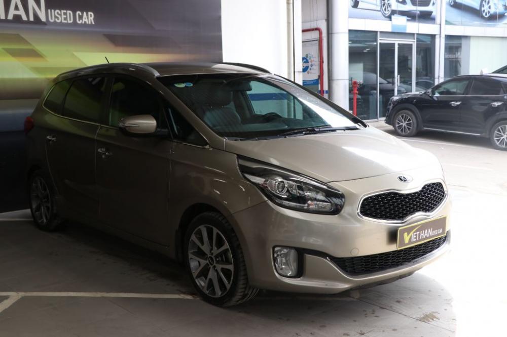 Kia Rondo 1.7MT 2015 - Bán xe Kia Rondo 1.7MT 2015, màu vàng, giá chỉ 548 triệu