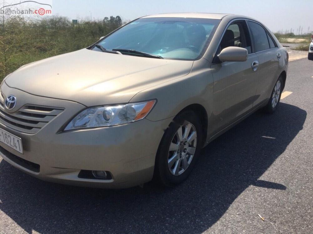 Toyota Camry 2.4 2007 - Bán Toyota Camry 2.4 sản xuất 2007, màu vàng, nhập khẩu nguyên chiếc chính chủ 