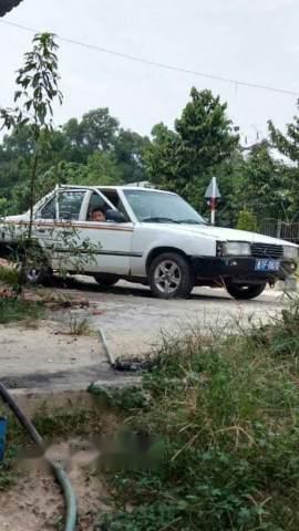 Toyota Corolla 1988 - Bán Toyota Corolla 1988, màu trắng, máy móc êm