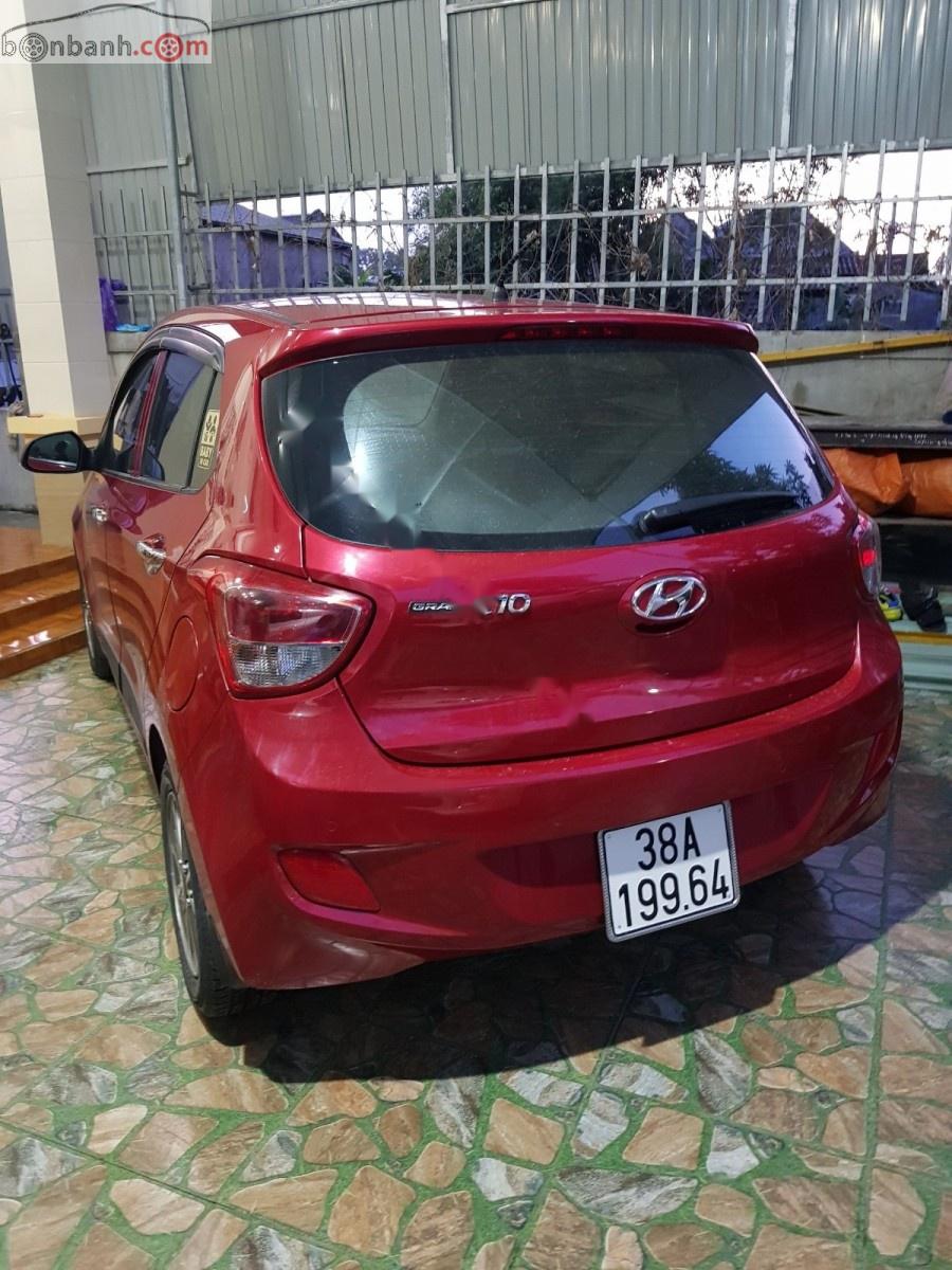 Hyundai Grand i10 AT 2015 - Cần bán xe Hyundai Grand i10 AT sản xuất 2015, màu đỏ, nhập khẩu nguyên chiếc số tự động giá cạnh tranh