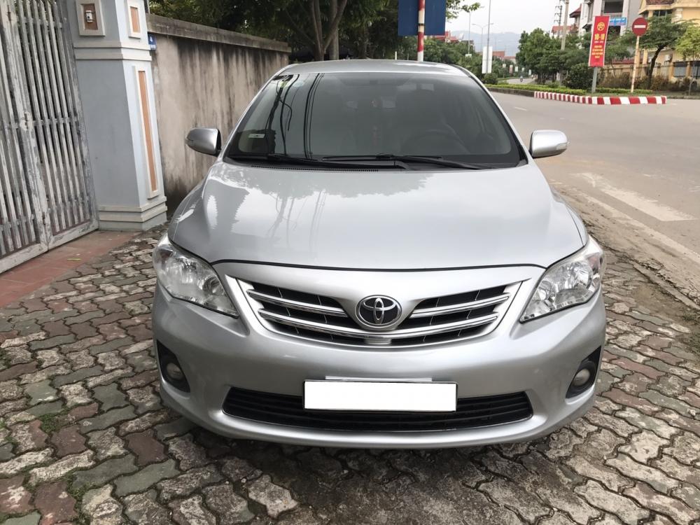 Toyota Corolla altis 1.8 G 2013 - Bán xe Toyota Corolla Altis 1.8G đời 2013, màu bạc. Hàng cực tuyển