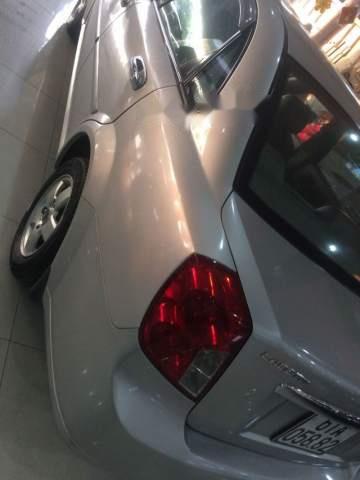 Chevrolet Lacetti 2012 - Bán Chevrolet Lacetti đời 2012, màu bạc xe gia đình