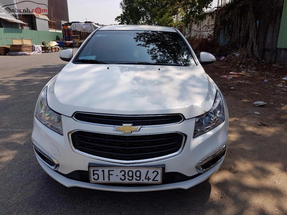 Chevrolet Cruze LT 1.6 MT 2016 - Cần bán Chevrolet Cruze LT 1.6 MT 2016, màu trắng như mới 