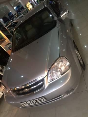 Chevrolet Lacetti 2012 - Bán Chevrolet Lacetti đời 2012, màu bạc xe gia đình