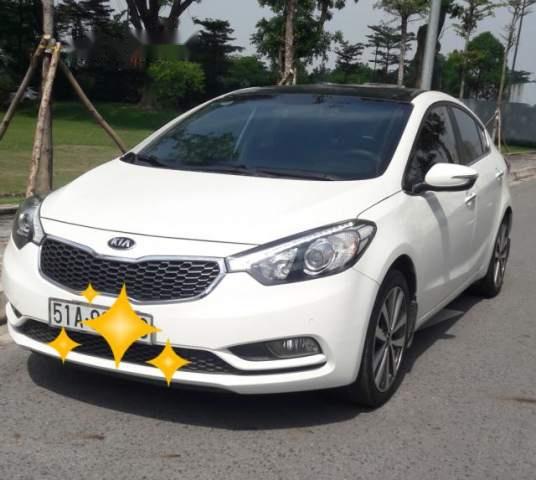 Kia K3  2.0   2015 - Cần bán lại xe Kia K3 2.0 năm sản xuất 2015, màu trắng 