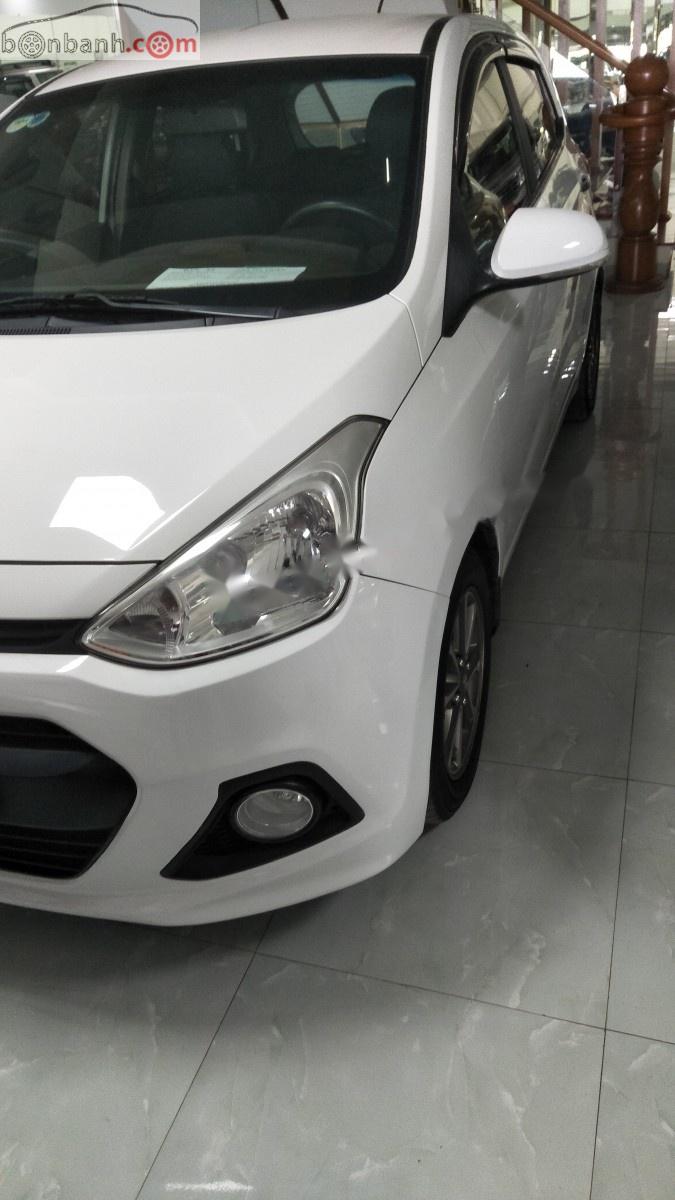 Hyundai Grand i10 1.0 MT 2015 - Bán Hyundai Grand i10 1.0 MT năm sản xuất 2015, màu trắng, xe nhập chính chủ