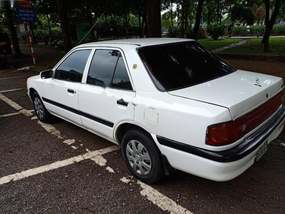 Mazda 323 1.6 MT 1995 - Bán Mazda 323 1.6 MT đời 1995, màu trắng, xe nhập