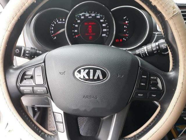 Kia Rio  1.4AT 2015 - Bán Kia Rio 1.4AT đời 2015, màu trắng, nhập khẩu nguyên chiếc số tự động giá cạnh tranh