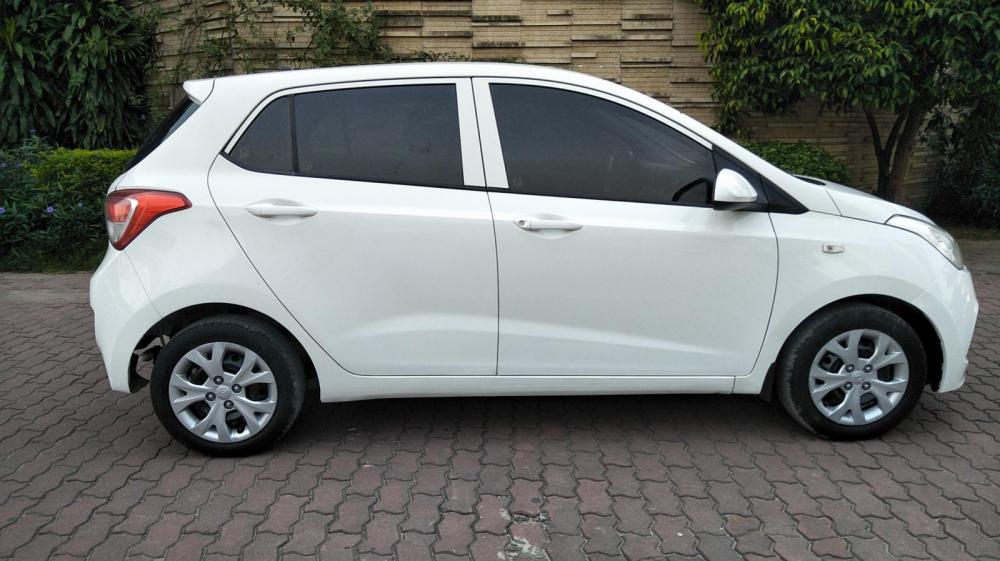 Hyundai Grand i10 MT 2015 - Cần bán xe Hyundai Grand i10 MT năm sản xuất 2015, màu trắng, nhập khẩu nguyên chiếc