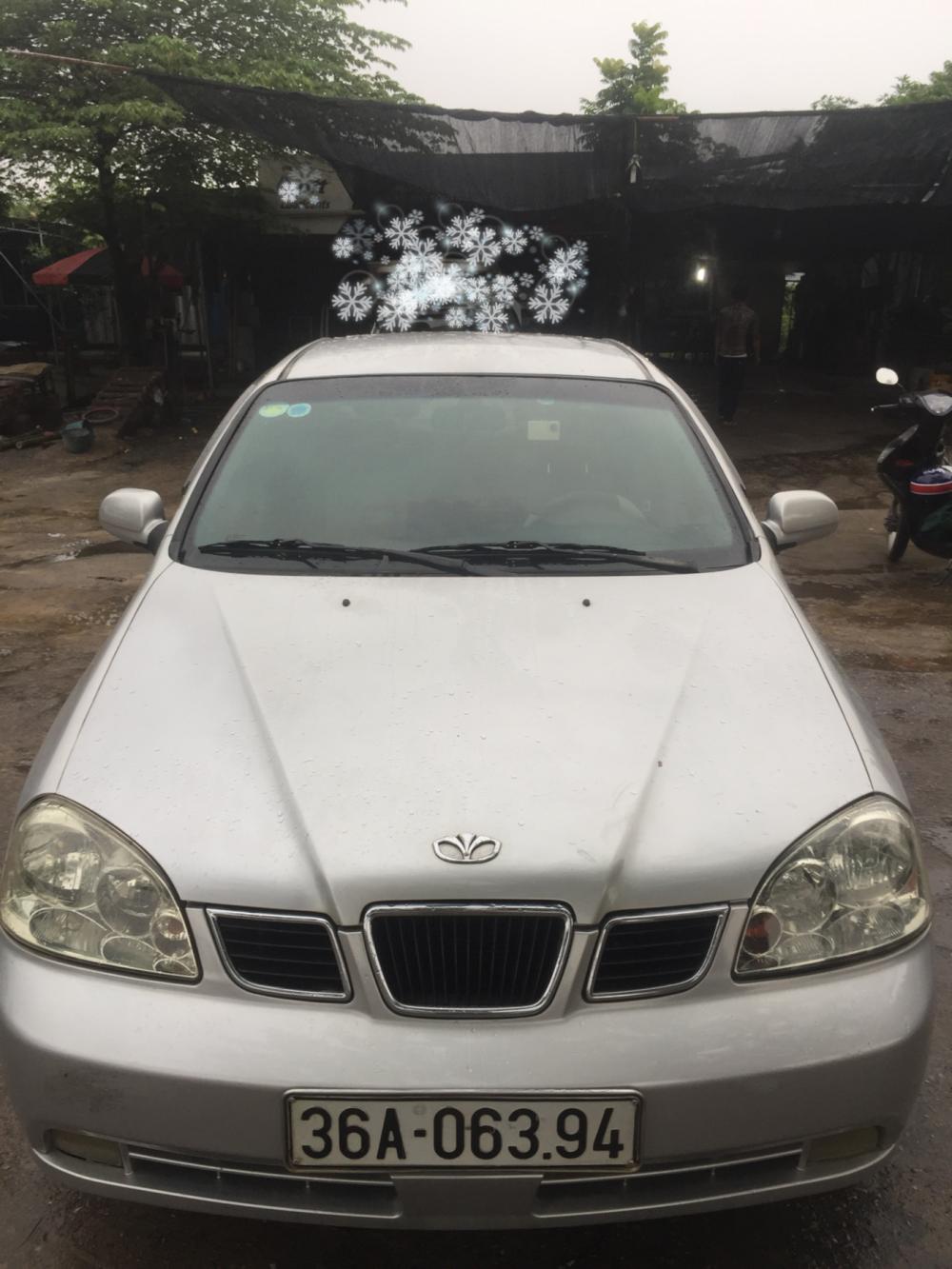 Daewoo Lacetti 2004 - Cần bán xe Daewoo Lacetti năm 2004, màu bạc 