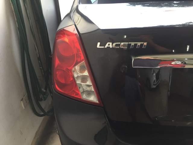 Chevrolet Lacetti 1.6 MT 2014 - Cần bán xe Chevrolet Lacetti 1.6 MT đời 2014, màu đen  