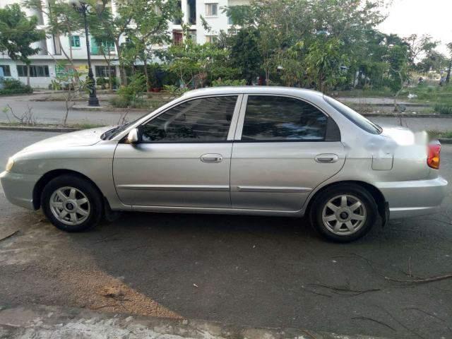 Kia Spectra 2005 - Cần bán Kia Spectra đời 2005, màu vàng, nhập khẩu nguyên chiếc, 148 triệu