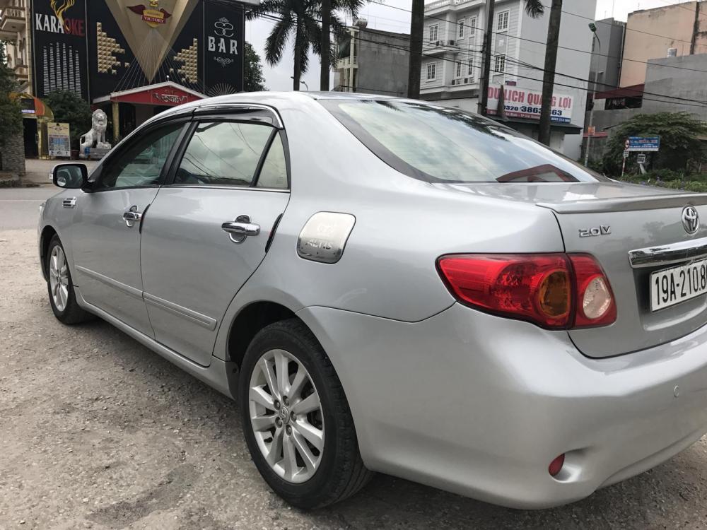 Toyota Corolla altis 2009 - Cần bán gấp Toyota Corolla Altis sản xuất 2009, màu bạc, 440 triệu