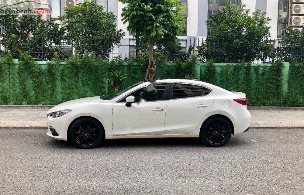 Mazda 3 2015 - Cần bán lại xe Mazda 3 đời 2015, màu trắng chính chủ, 620 triệu