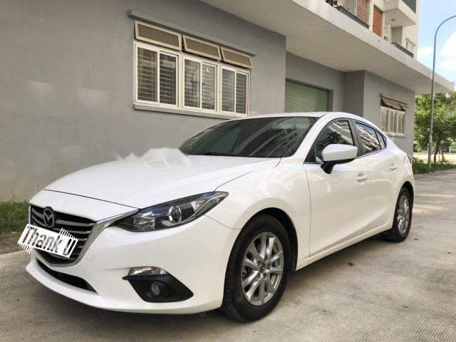 Mazda 3 2016 - Cần bán gấp Mazda 3 sản xuất 2016, màu trắng, 618 triệu