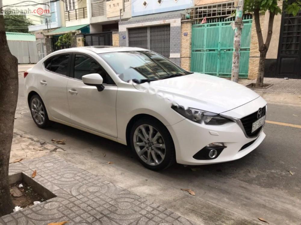 Mazda 3 2.0 AT 2016 - Cần bán lại xe Mazda 3 2.0 AT sản xuất năm 2016, màu trắng đẹp như mới