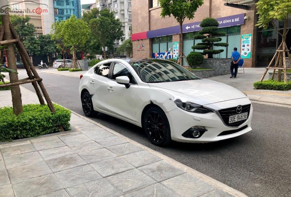 Mazda 3 2015 - Cần bán lại xe Mazda 3 đời 2015, màu trắng chính chủ, 620 triệu