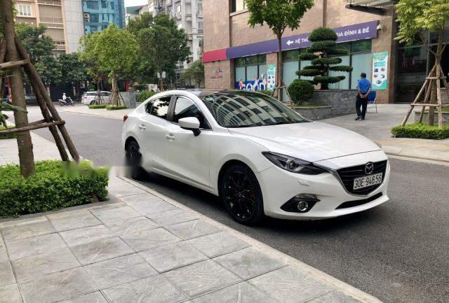 Mazda 3 2.0 2015 - Bán xe Mazda 3 2.0 2015, màu trắng, 625 triệu