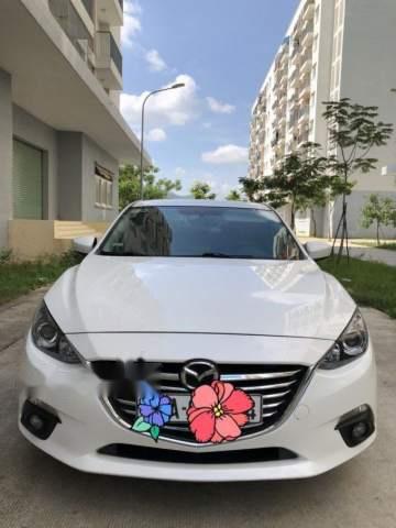 Mazda 3 2016 - Cần bán gấp Mazda 3 sản xuất 2016, màu trắng, 618 triệu