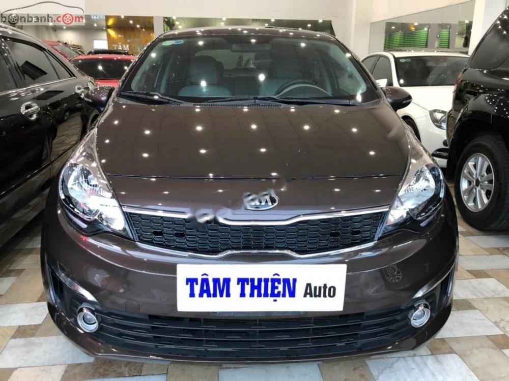 Kia Rio 1.4 AT 2015 - Bán xe Kia Rio 1.4 AT năm sản xuất 2015, màu nâu, nhập khẩu