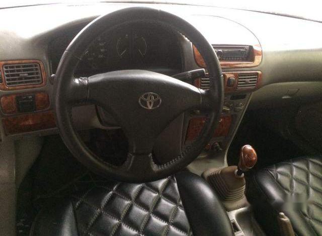 Toyota Corolla 2001 - Bán xe Toyota Corolla đời 2001, màu trắng xe gia đình