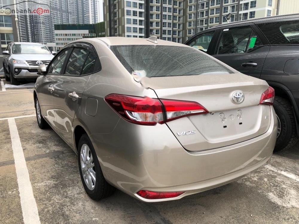 Toyota Vios 1.5E CVT 2018 - Bán xe Toyota Vios 1.5E CVT đời 2018, màu vàng