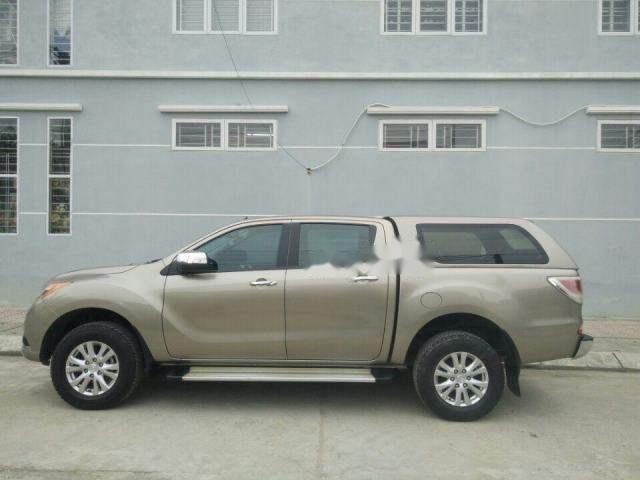 Mazda BT 50   2015 - Bán xe Mazda BT 50 đời 2015, màu vàng, xe nhập