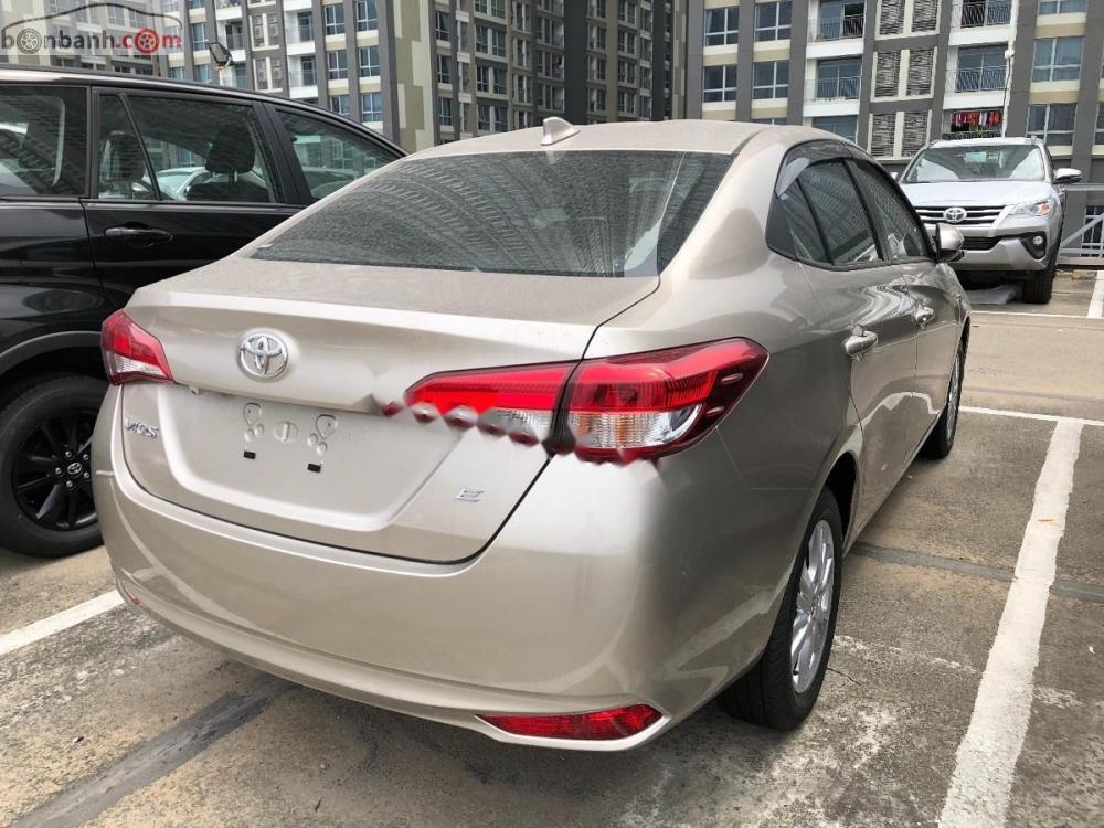 Toyota Vios 1.5E CVT 2018 - Bán xe Toyota Vios 1.5E CVT đời 2018, màu vàng