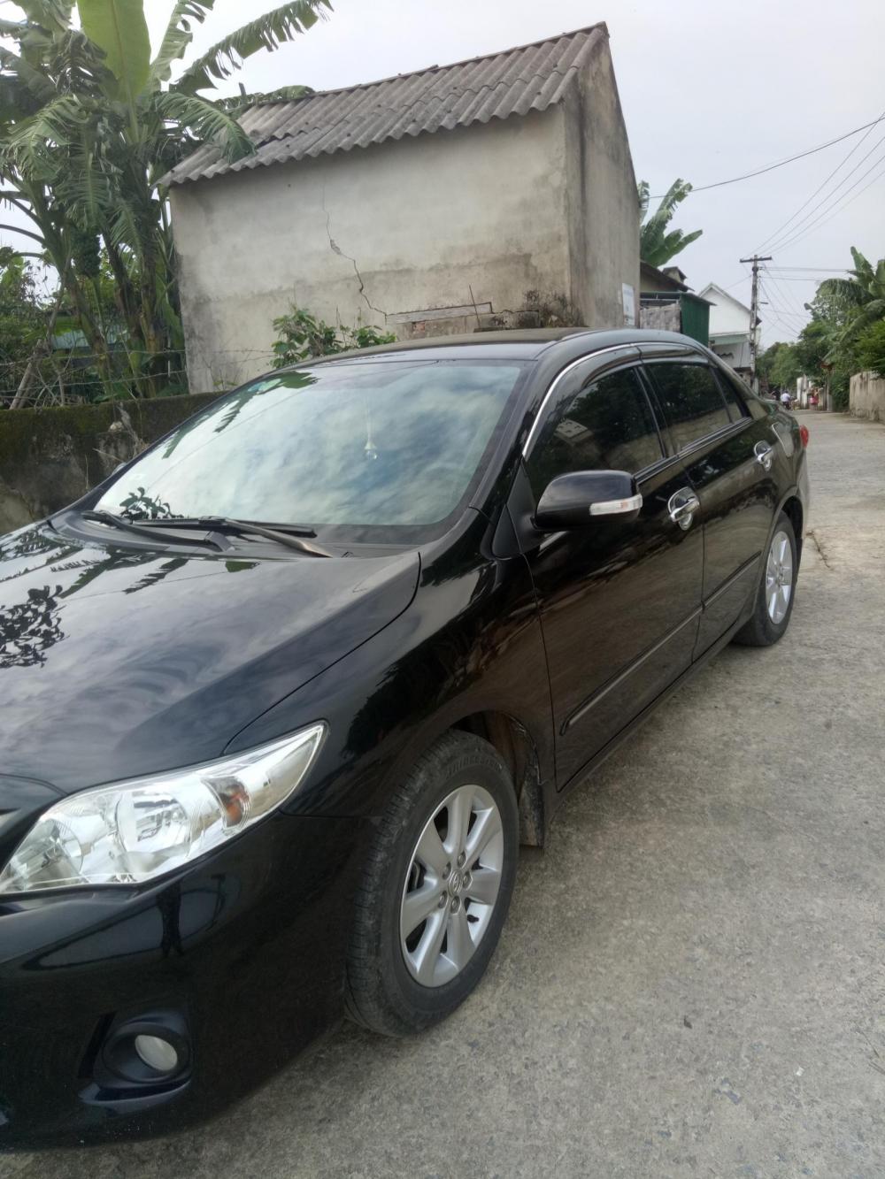 Toyota Corolla altis AT 2014 - Cần bán Toyota Corolla Altis AT năm 2014, màu đen như mới  