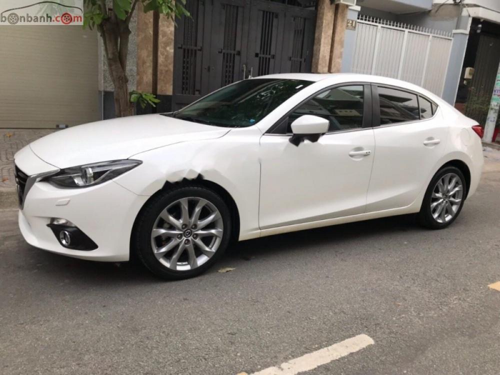 Mazda 3 2.0 AT 2016 - Cần bán lại xe Mazda 3 2.0 AT sản xuất năm 2016, màu trắng đẹp như mới
