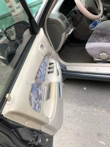 Toyota Corolla   2001 - Bán Toyota Corolla năm 2001, màu xám chính chủ