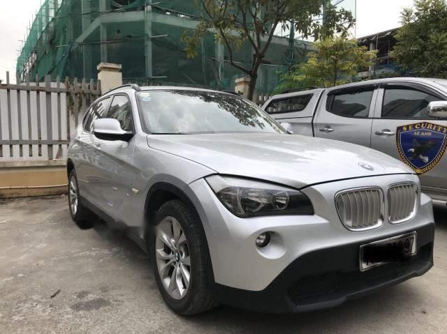 BMW X1 2012 - Cần bán BMW X1 sản xuất 2012, màu bạc, nhập khẩu, 586 triệu