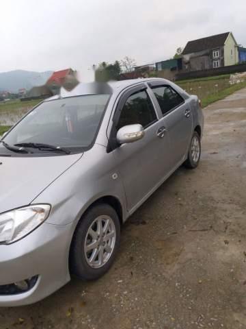 Toyota Vios   1.5E AT 2009 - Cần bán gấp Toyota Vios 1.5E AT 2009, màu bạc, xe nhập số tự động