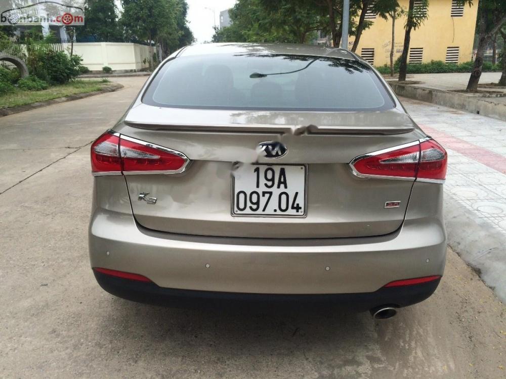 Kia K3 2015 - Chính chủ bán xe Kia K3 đời 2015, màu vàng cát