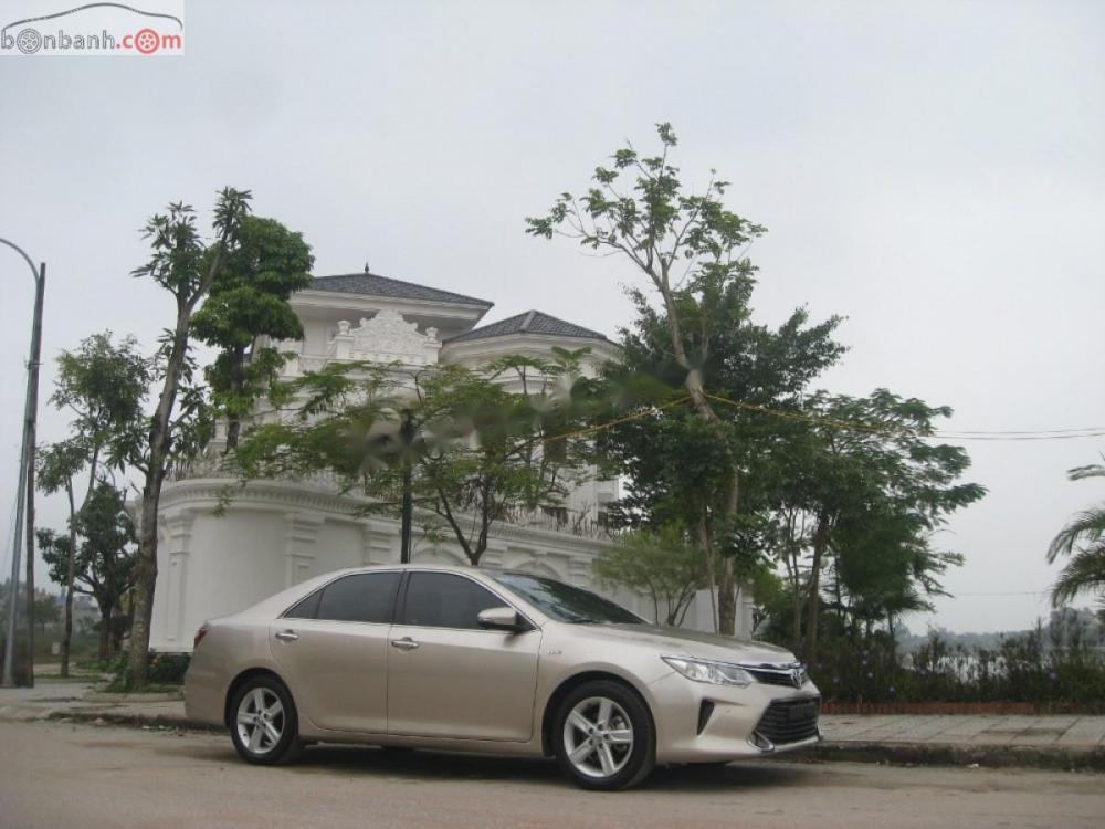 Toyota Camry 2.5Q 2015 - Cần bán xe Toyota Camry 2.5Q đời 2015, màu vàng