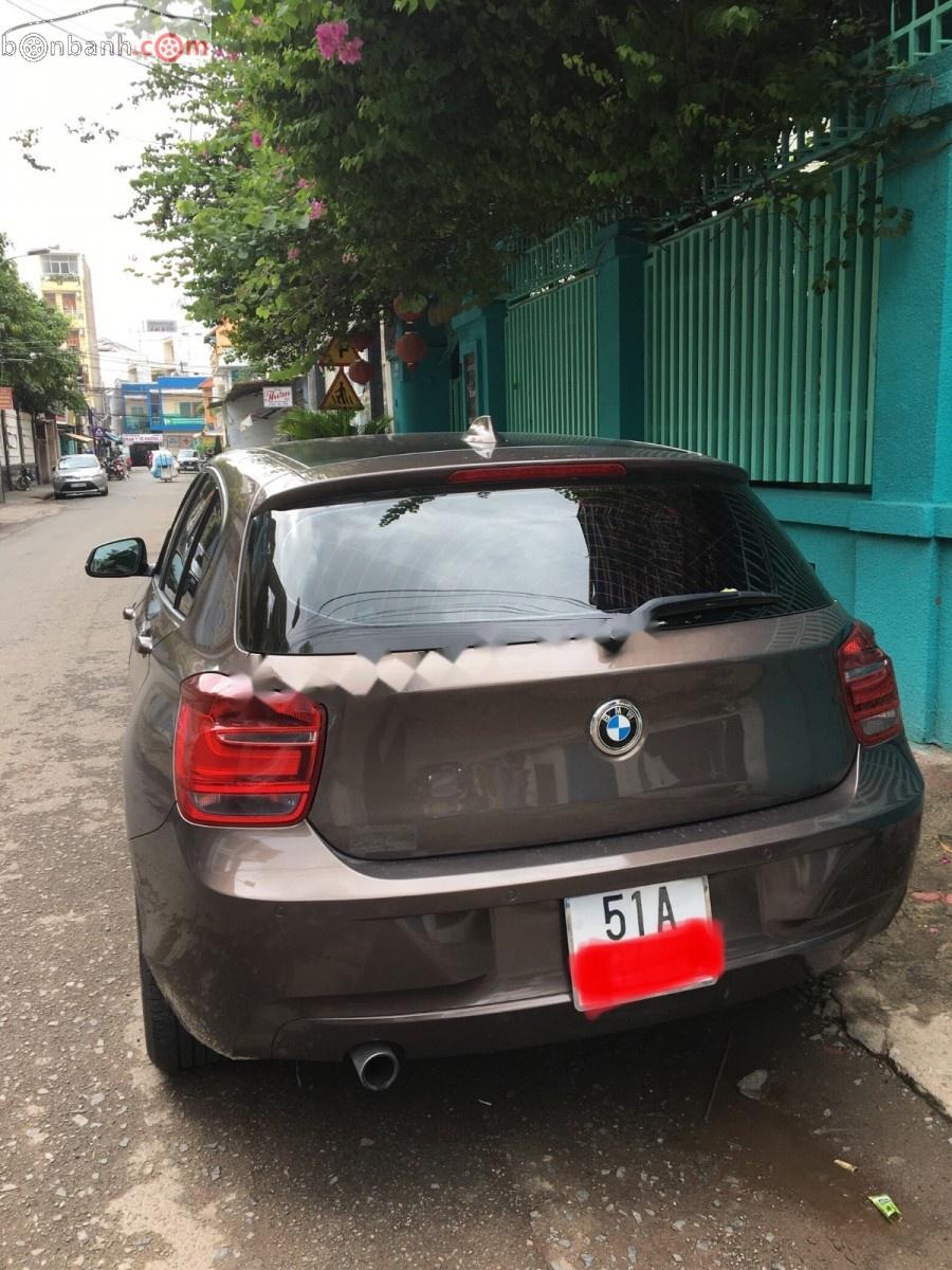 BMW 1 Series 116i 2014 - Bán BMW 1 Series 116i năm sản xuất 2014, màu nâu, xe nhập, giá 850tr